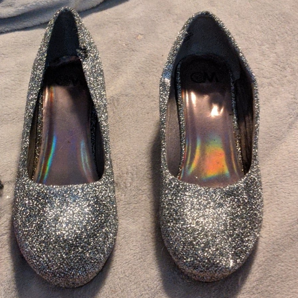 Silver and black heels